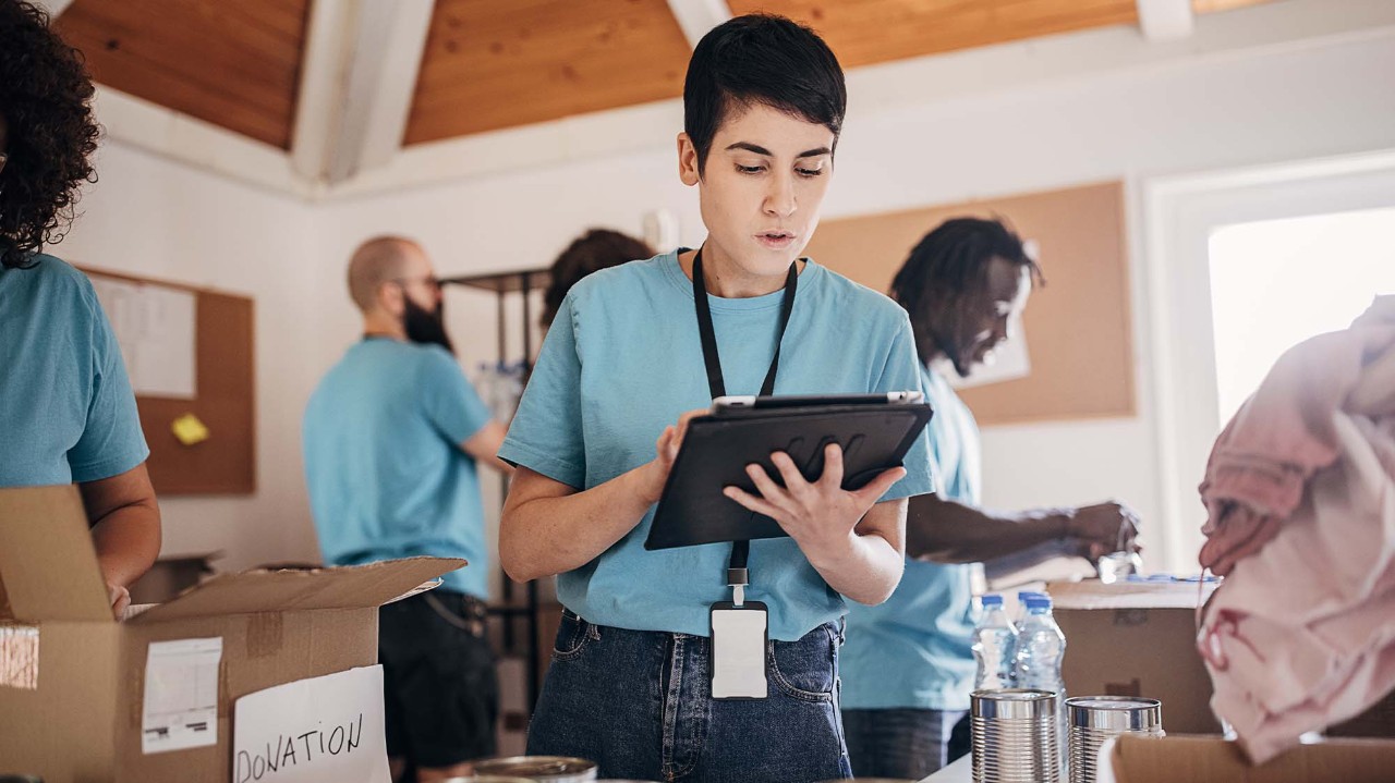 Non profit worker ordering supplies on a tablet